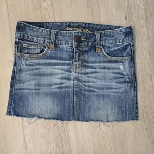 American Eagle Outfitters Light Blue Denim Skirt with Yellow Embroidery